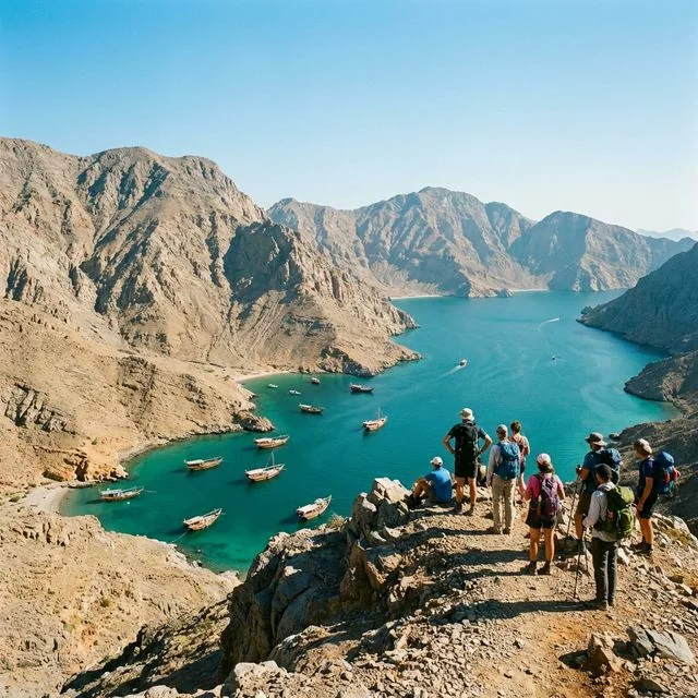 Hikers overlooking a Musandam Fjord